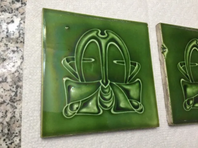 Pair of Art Nouveau  Majolica, porcelain tiles Marked  Copyright on back