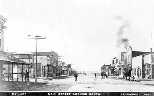 Main Street View Drug Store Bridgeport Nebraska NE Reprint Postcard