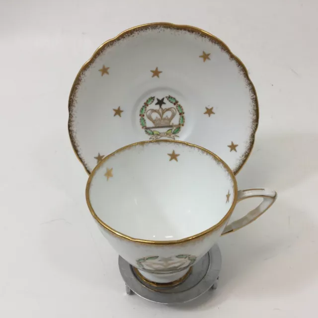 Taza de té y platillo de patas Royal Stafford corona y hueso de espada China Inglaterra de colección