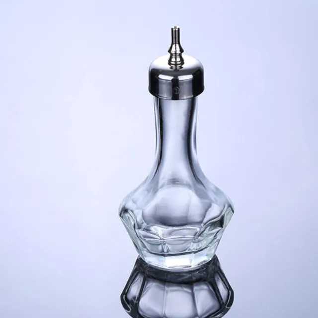 2 piezas botellas pequeñas de vidrio amargas con tapa anticuadas