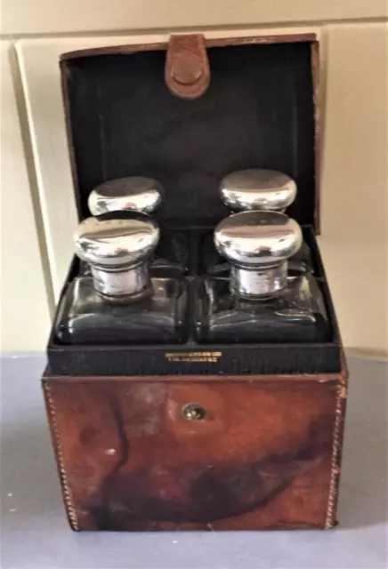 Gentlemans Antique Mappin & Webb Silver Topped Cologne Bottles in Leather Case