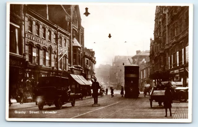 POSTCARD Granby Street Leicester, policeman, old cars, tram, real photo