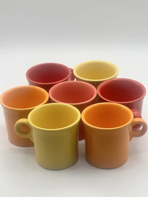 Fiesta Ware Set Of 7 O Ring Handle Mug 2 Each Yellow Red And Orange And 1 Pink