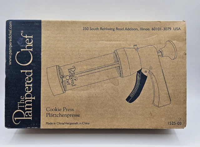 Prensa de galletas con discos The Pampered Chef con 16 formas en caja