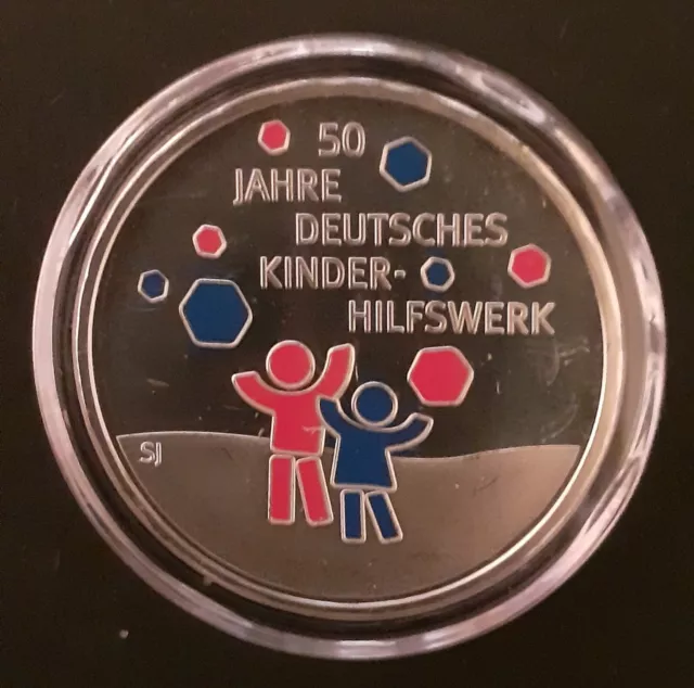 20 Euro Silbermünze - 50 Jahre Deutsches Kinderhilfswerk - unzirkuliert, Kapsel