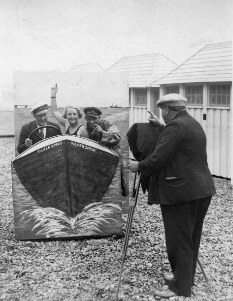 BEACH PHOTOGRAPHY USING a cut-out speedboat 'prop' at Brighton beach ...