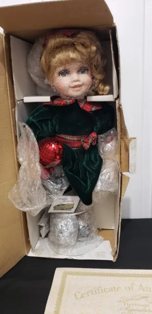 HERITAGE SIGNATURE COLLECTION Porcelain Christmas doll “ Rachael” With COA