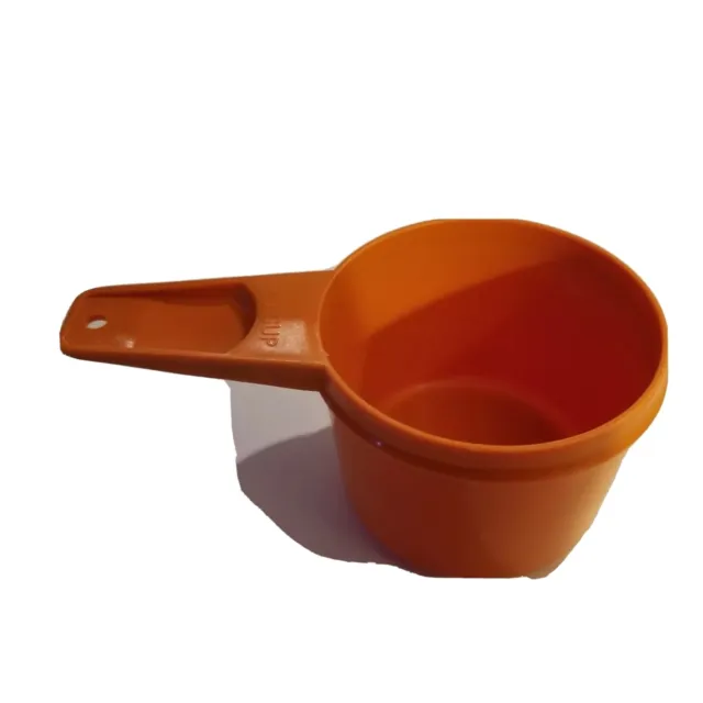 https://www.picclickimg.com/m7IAAOSw3J1gqw9d/Tupperware-Measuring-Cup-Burnt-Orange-3-4-Cup-Size.webp