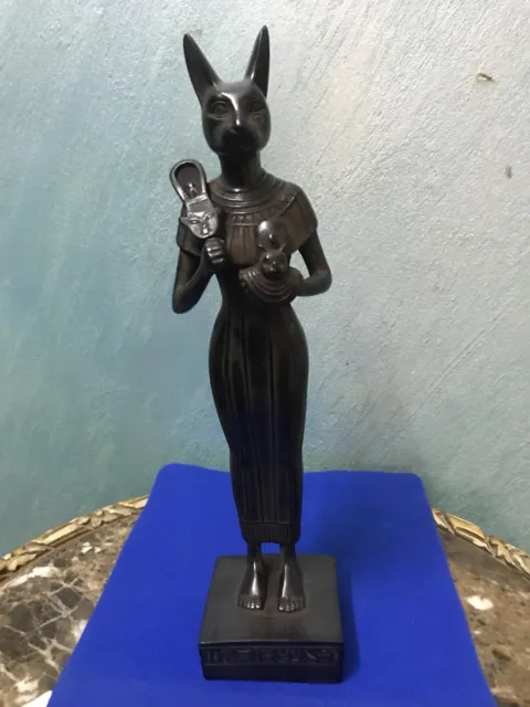 Pharaonic statue of a standing Egyptian cat, a symbol of happiness