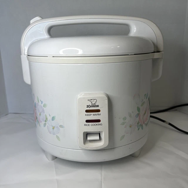 ZOJIRUSHI MADE IN Japan rice cooker 5.5 cups Model No NFR1803 95.00