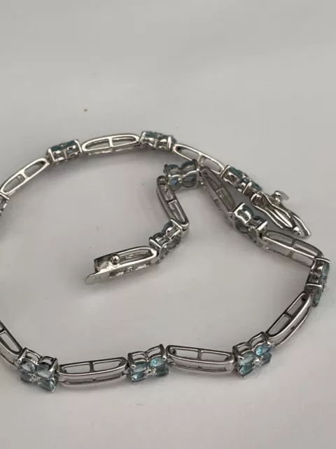 9ct white  gold  blue topaz bracelet 7.5 inches long QVC 6.8 grams