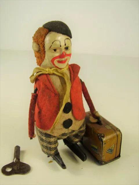 Antike Schuco Tanz Figur Clown mit Koffer vor 1945 3