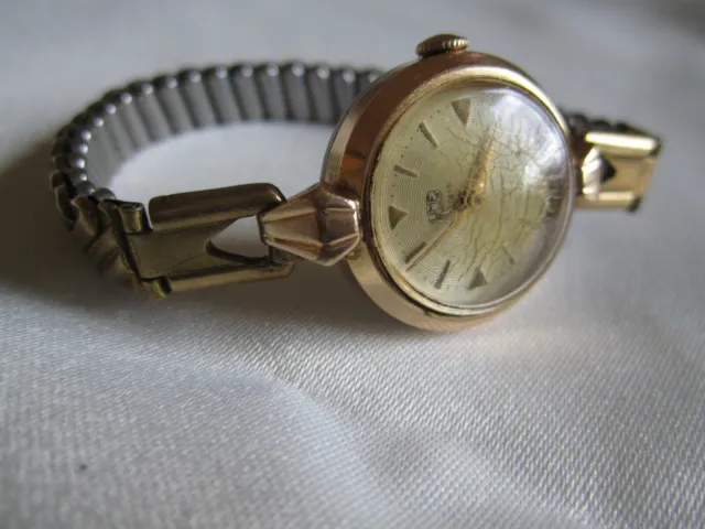 Schon ältere vergoldete Damen-Armbanduhr UMF RULA 5 RUBIS, Orig.-Stretch-Armband