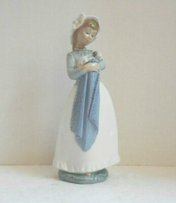 Nao by Lladro Daisa Girl Holding / Cradling Puppy Figurine Made in Spain