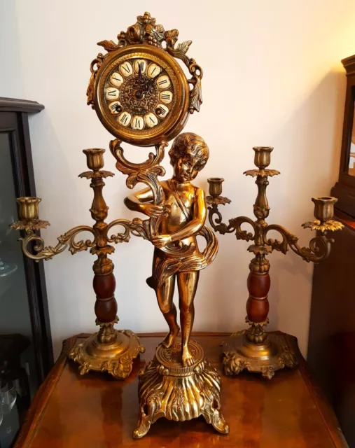 FRENCH STYLE FIGURAL MANTEL CLOCK by Franz Hermle.