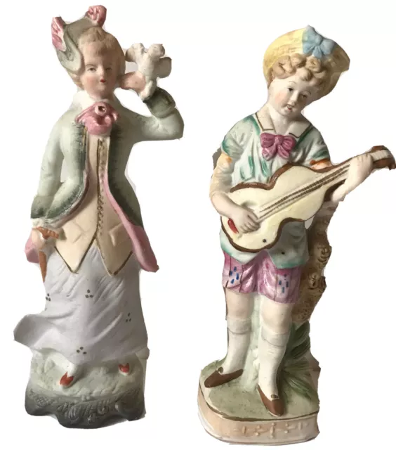 Victorian porcelain statues boy and guitar girl with bird hand painted Japan vtg