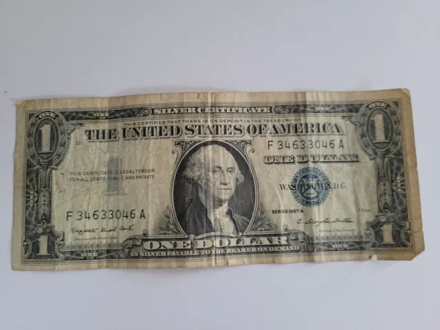 1957 A $1 One Dollar Silver Certificate Star Note with blue seald
