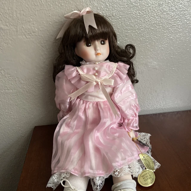 Brinn's Musical Doll with pink dress, drk brown hair porcelain