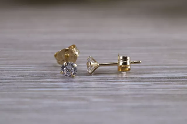 9ct Yellow Gold 2 mm Round C Z Set Stud Earrings