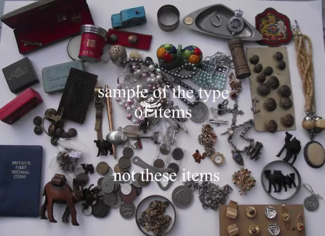 A Mixed lot including Coins,Watches,Collectables,Costume Jewellry Badges etc....