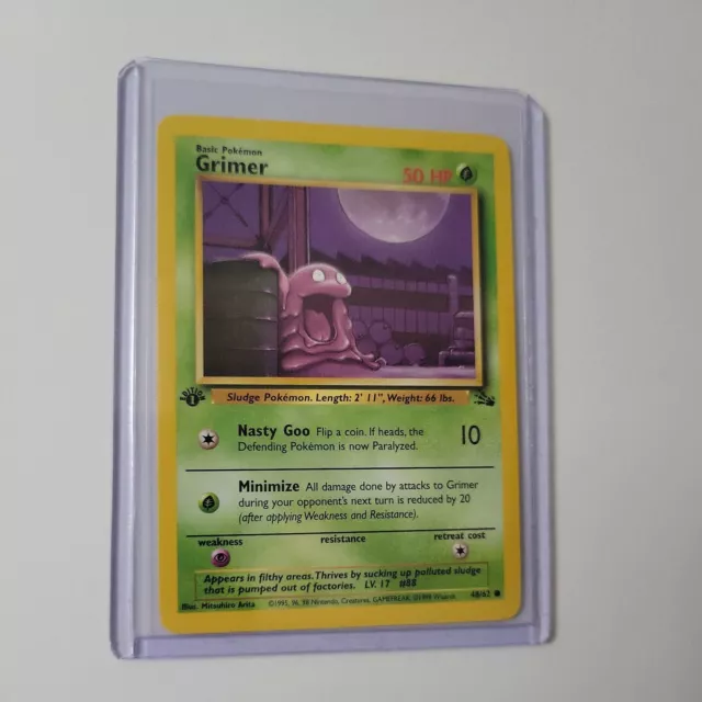 1st Edition Grimer 48/62 Fossil WOTC Pokemon Card Near Mint NM