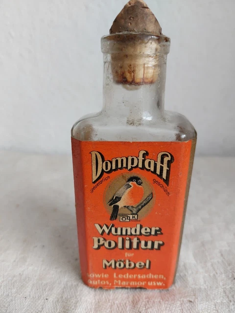 Alte Glasflasche m. Werbung " Dompfaff Möbel Politur " Vogel schönes Belegstück