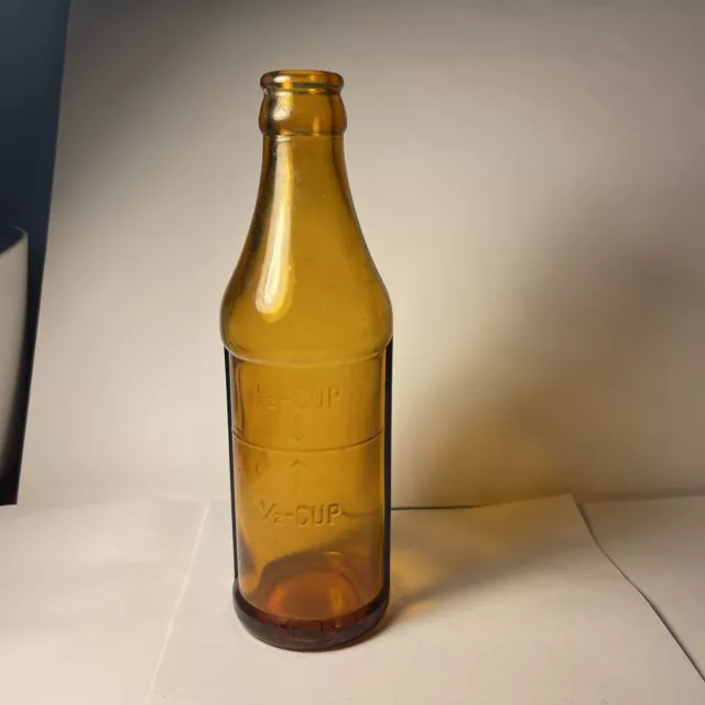Antique Glass Measuring Bottle