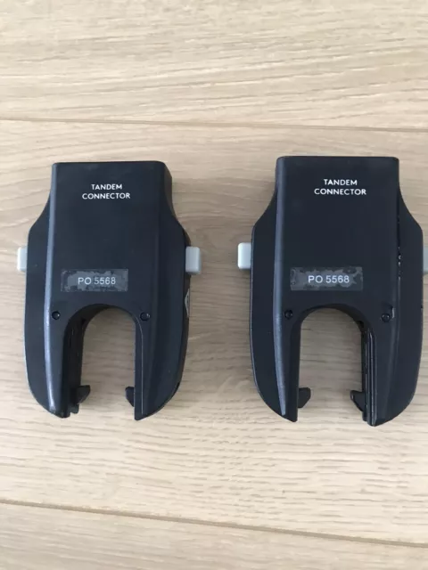 Adaptadores tándem cruzados plateados para cochecitos Wave o Coast