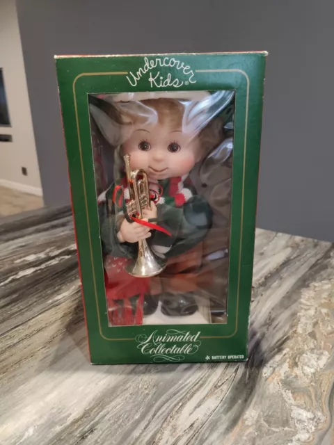 Santa's Best Undercover Kids Animated Christmas Collectable Trumpet Doll.