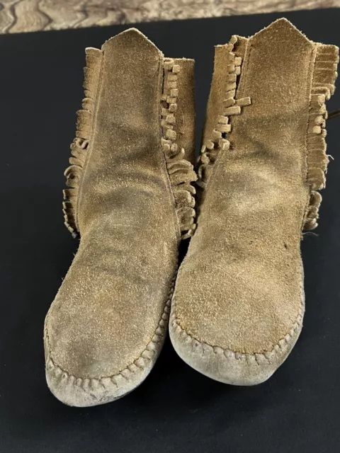 Taos trapper deals moccasins