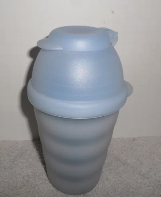 https://www.picclickimg.com/mGwAAOSwyiRZb9HU/Tupperware-Light-Blue-Impressions-Glass-3218-with-Shaker-Mixer.webp