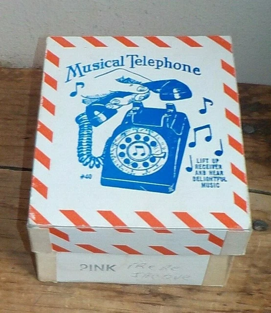 VINTAGE PINK PLASTIC Musical Rotary Dial Telephone Child Toy Phone Wind