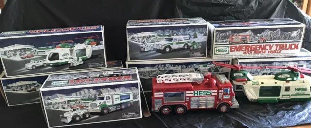 Lot of 9 Hess Trucks. 7 new in original boxes. 2 Out Of Boxes. Great Condition