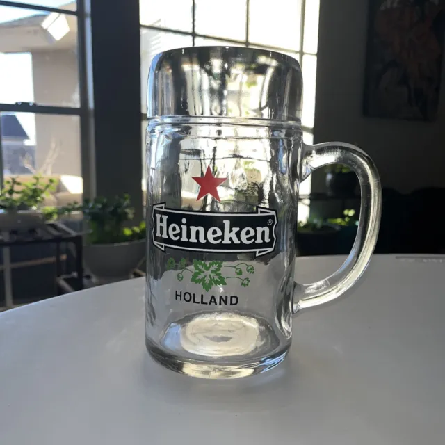 https://www.picclickimg.com/mIYAAOSwJkBlleim/Huge-HEINEKEN-HOLLAND-GLASS-MUG-BEER-STEIN-1.webp