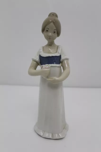 Rex Valencia Porcelain Female Figure Holding Flowers or Ice-cream