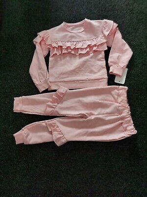 Girls Frilly pink lounge wear Set. Brand new with tags Age 8 Years