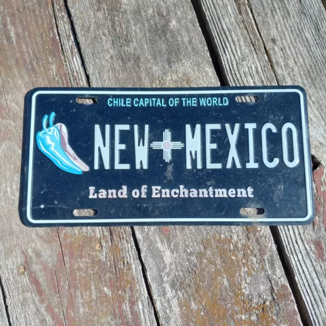 BOOSTER LICENSE PLATE: New Mexico Chile Capital of the World Land of Enchantment