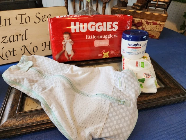 Aquaphor 14 Oz Woombis swaddle Huggies s 1 diapers and 56 count wipes Newborn Aquaphor 14 Oz Woombis swaddle Huggies s 1 diapers and 56 count wipes Newborn