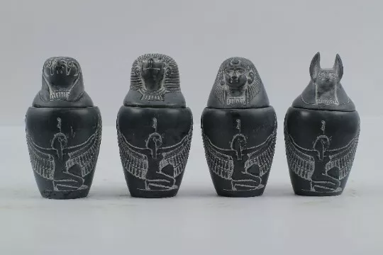 canopic jars (The Four organs Jars) with ISIS made from Egyptian Basalt stone