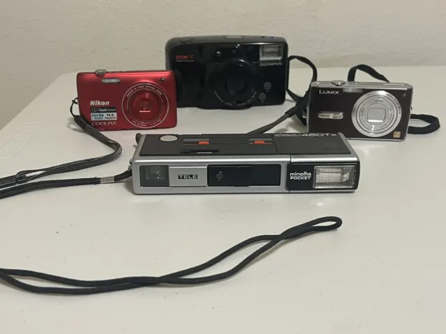 Lote de 4 cámaras digitales compactas diferentes de colección s-2 y una película de 110 y película de 35 mm