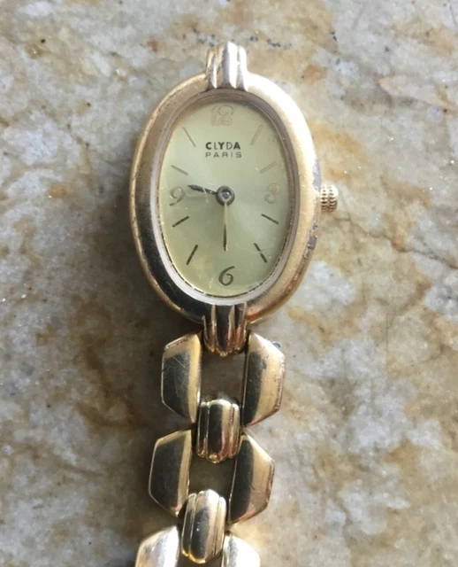CLYDA PARIS MONTRE femme plaqué or 18 k pile à changer mailon