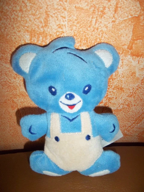 Doudou Nestlé Ours Bleu Semi Plat Salopette Beige