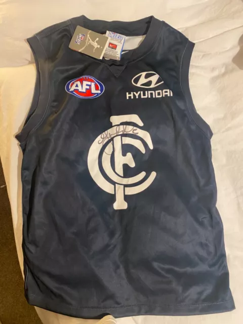 signed Chris Judd AFL jersey size s. New with tags on. Never worn