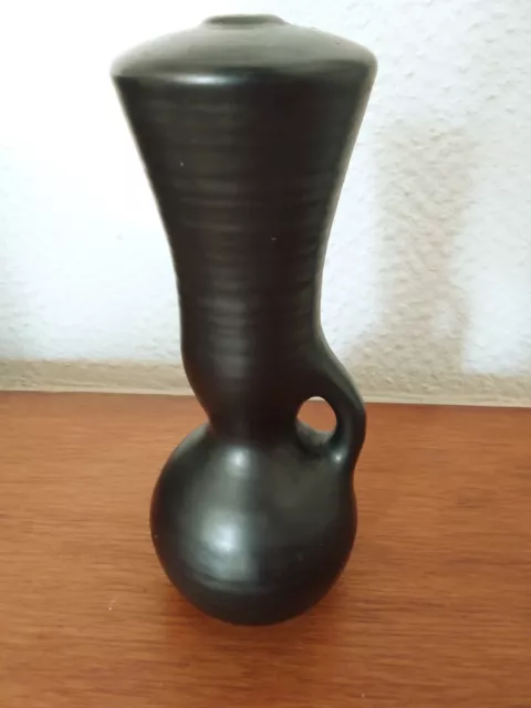 Accolay, Pied de lampe en ceramique émaillée noire .