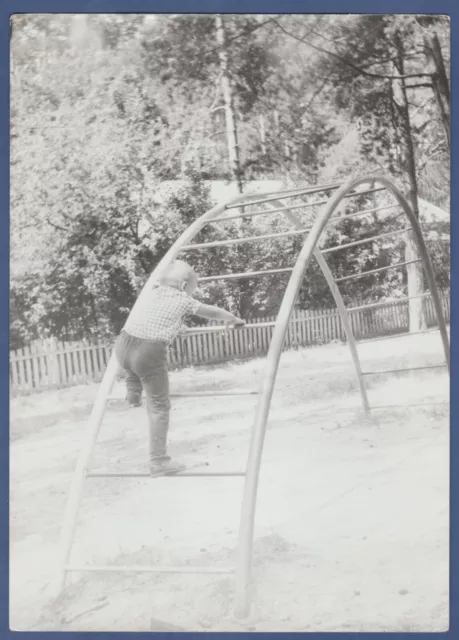 Beautiful boy playing on the playground, cute kid Soviet Vintage Photo USSR