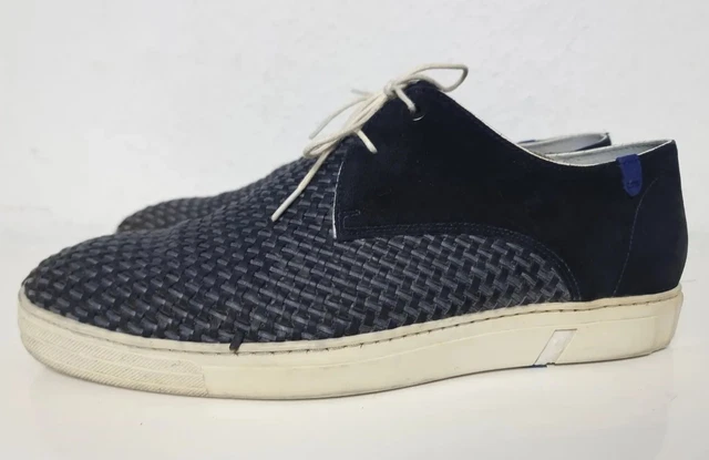 vans nere intrecciate