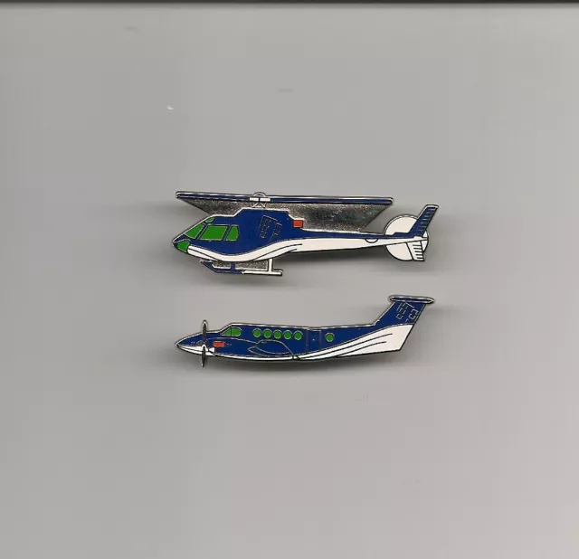 Lot de 2 Pin's Arthus Bertrand avion et hélico