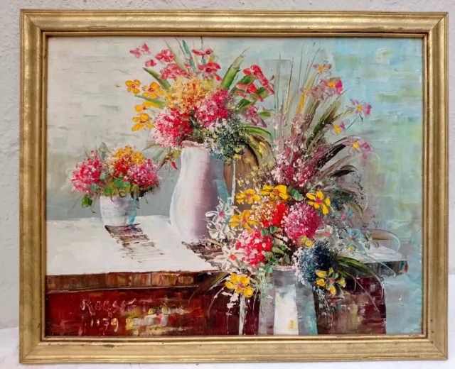 Trois vases de fleurs . Huile sur toile 40x50cm  Signé: ROUSSET.  Cadre 46x56 cm