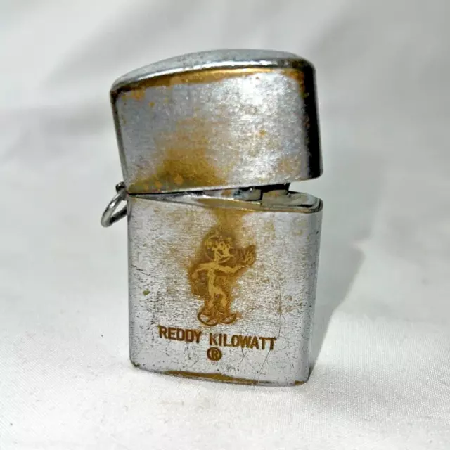 Vintage Reddy Kilowatt Lighter Made in Japan Price Associates Engraved