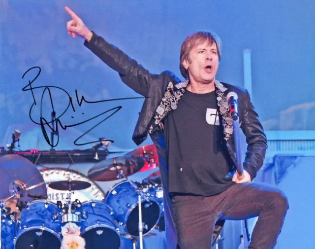A fantastic 10x8 Autographed Photo of Bruce Dickinson & CoA